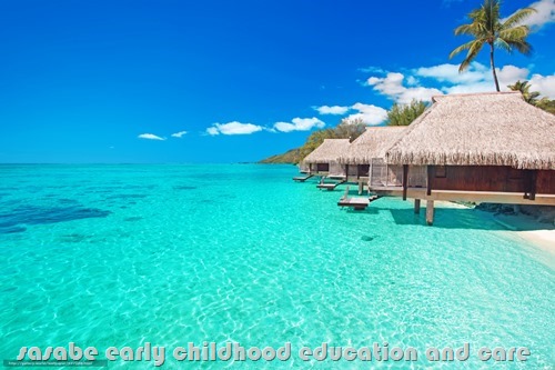 Villas on the tropical beach with steps into water